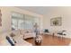 Bright living room features a window and a comfortable seating area at 111 2Nd St, Nokomis, FL 34275