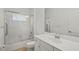 A full bathroom featuring shower, tub, toilet, and vanity sink with drawers at 11415 Fort Lauderdale Pl, Venice, FL 34293