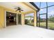 Covered patio area featuring seamless access to the interior, plus a fan for cooling off in the outdoors at 11415 Fort Lauderdale Pl, Venice, FL 34293