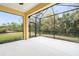 Spacious screened-in patio providing a relaxing outdoor space with views of the backyard and greenery at 11415 Fort Lauderdale Pl, Venice, FL 34293