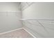 Walk-in closet featuring wire shelving for optimal organization and storage space at 11558 Renaissance Blvd, Venice, FL 34293