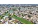 A panoramic aerial view showcases a beautiful waterfront community surrounded by canals and lakes at 1220 Lakeside Dr, Venice, FL 34293
