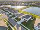 Aerial view showcasing the home and nearby lakes in a Gathering-friendly community at 12637 Promenade Estates Blvd, Sarasota, FL 34238