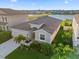 An aerial view of the home highlighting its well-maintained landscaping at 12637 Promenade Estates Blvd, Sarasota, FL 34238