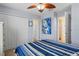 Light and airy bedroom showcasing a closet and ensuite bathroom, and bright walls at 12679 Sagewood Dr, Venice, FL 34293