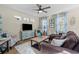 Bright living room showcasing neutral paint, stylish decor, and comfortable furnishings at 12679 Sagewood Dr, Venice, FL 34293