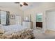 Spacious main bedroom with vaulted ceilings and an ensuite bathroom at 12679 Sagewood Dr, Venice, FL 34293