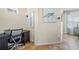 Home office featuring a sleek black desk with drawers and a comfortable office chair at 12679 Sagewood Dr, Venice, FL 34293