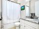 The bathroom includes a toilet, shower, and vanity with granite countertops at 13652 Classico Ct, Venice, FL 34293