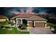 Beautiful single-story home with a brick driveway, two-car garage, and well-manicured landscaping at 13652 Classico Ct, Venice, FL 34293