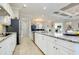 Spacious kitchen with granite countertops, stainless steel appliances, and ample counter space at 13652 Classico Ct, Venice, FL 34293