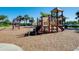 A vibrant playground featuring slides, climbing structures, and swings, ideal for Gathering fun at 13652 Classico Ct, Venice, FL 34293
