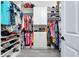 A well-organized walk-in closet with ample shelving and hanging space for clothes and accessories at 13652 Classico Ct, Venice, FL 34293