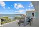 Spacious balcony featuring comfortable seating and stunning views of the bay at 14 Grouper Hole Dr, Boca Grande, FL 33921
