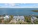 Gorgeous waterfront estate with lush landscaping and breathtaking water views at 14 Grouper Hole Dr, Boca Grande, FL 33921