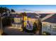 Elegant coastal home featuring lush landscaping and ample parking at twilight at 14 Grouper Hole Dr, Boca Grande, FL 33921