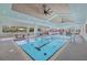 Indoor pool and recreation area with gym and ping pong table at 14 Grouper Hole Dr, Boca Grande, FL 33921