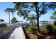 Elevated wooden boardwalk leading to the scenic beach at 150 Fiesole St, Venice, FL 34285