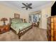 Relaxing main bedroom with a decorative ceiling fan, and a bay window that provides natural light at 162 Treviso Ct, North Venice, FL 34275