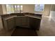 Open kitchen features stainless steel appliances, granite countertops and ample cabinet space at 17370 Cape Horn Blvd, Punta Gorda, FL 33955