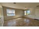 Open-concept living room features tile floors and natural light from multiple windows at 17370 Cape Horn Blvd, Punta Gorda, FL 33955