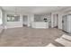 Spacious living room with tile floors, open to the kitchen and dining areas at 17370 Cape Horn Blvd, Punta Gorda, FL 33955