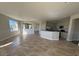 Spacious open-concept living and dining area with tile flooring and natural light at 17370 Cape Horn Blvd, Punta Gorda, FL 33955