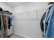 A walk-in closet with white walls, wire shelving, and carpet flooring at 17449 Luminous Ave, Venice, FL 34293