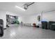Spacious garage with epoxy flooring and ample storage space at 17449 Luminous Ave, Venice, FL 34293