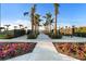 Community mailboxes are surrounded by lush landscaping and palm trees creating a welcoming and attractive place to retrieve your mail at 17449 Luminous Ave, Venice, FL 34293
