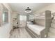 Bedroom features a bunk bed with drawers and a ceiling fan at 1837 Upper Cove Ter, Sarasota, FL 34231