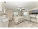 Serene bedroom with a king-size bed, neutral decor, and ample natural light at 1837 Upper Cove Ter, Sarasota, FL 34231