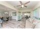 Open-concept living space with dining area and bright, natural light throughout at 1837 Upper Cove Ter, Sarasota, FL 34231