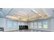 Bright yoga studio with natural light, ceiling fans, and weights provides an ideal space for fitness at 19180 Mangieri St, Venice, FL 34293