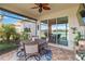 Entertain guests on this screened lanai with a ceiling fan and direct access to the backyard at 20389 Minuet Pl, Venice, FL 34293