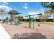 Fun playground area with colorful equipment, swings, and a soft ground cover, perfect for to play and socialize at 20389 Minuet Pl, Venice, FL 34293