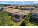 This home boasts a beautiful pool within a screened enclosure, nestled among other homes in a well-maintained neighborhood at 2042 Mesic Hammock Way, Venice, FL 34292