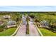 Scenic entrance to Stoneybrook at Venice with manicured landscaping and signage at 2042 Mesic Hammock Way, Venice, FL 34292
