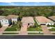Charming home with brick driveway, well-manicured lawn, and attractive landscaping at 2042 Mesic Hammock Way, Venice, FL 34292