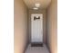 Traditional white front door with a glass window above, offering a warm welcome to visitors with a 