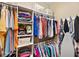 Walk-in closet featuring organized storage solutions for clothing and accessories at 2042 Mesic Hammock Way, Venice, FL 34292