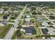 Aerial view of a suburban neighborhood with tidy homes at 2114 S Biscayne Dr, North Port, FL 34287