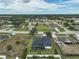 A high aerial shot displaying the property and its neighborhood at 2114 S Biscayne Dr, North Port, FL 34287