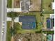 Birds eye view of the property, nearby houses, and 'school' street sign at 2114 S Biscayne Dr, North Port, FL 34287