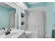 Updated bathroom features a shower-tub, stylish vanity and tile floor at 2114 S Biscayne Dr, North Port, FL 34287