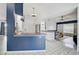Updated kitchen featuring white cabinets, stainless steel appliances, and tile floors at 2114 S Biscayne Dr, North Port, FL 34287