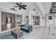 Inviting outdoor patio with comfortable seating and access to the interior and featuring a ceiling fan at 2114 S Biscayne Dr, North Port, FL 34287