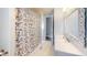 Bathroom featuring floral shower curtain, white vanity and neutral flooring at 218 Palm Air Dr, Osprey, FL 34229