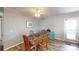 Cozy dining area with a wooden table and four chairs at 218 Palm Air Dr, Osprey, FL 34229