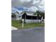 Charming single-story home with manicured lawn at 218 Palm Air Dr, Osprey, FL 34229